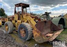 Gumikerekes homlokrakodók International Harvester H-60E
