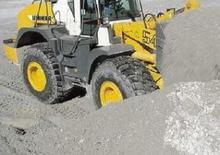 Gumikerekes homlokrakodók Liebherr L 554