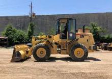 Gumikerekes homlokrakodók New Holland LW 110