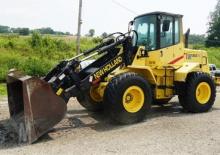 Gumikerekes homlokrakodók New Holland LW 130 TC