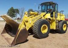 Gumikerekes homlokrakodók New Holland LW190