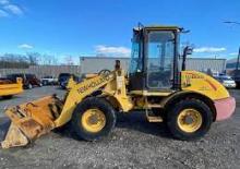 Gumikerekes homlokrakodók New Holland LW80 B