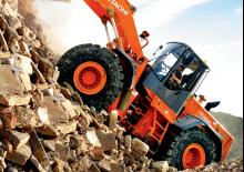 Gumikerekes homlokrakodók Hitachi LX 210 E