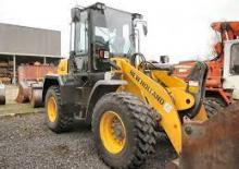 Gumikerekes homlokrakodók New Holland W110C