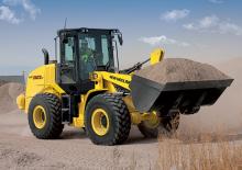 Gumikerekes homlokrakodók New Holland W 110