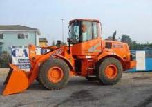 Gumikerekes homlokrakodók Fiat Kobelco W 130
