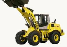 Gumikerekes homlokrakodók New Holland W 170 TC