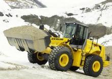 Gumikerekes homlokrakodók New Holland W 190 Evolution