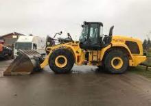 Gumikerekes homlokrakodók New Holland W270C