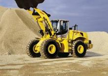 Gumikerekes homlokrakodók New Holland W 270 Evolution