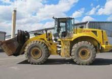 Gumikerekes homlokrakodók New Holland W 270