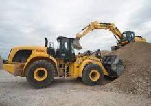 Gumikerekes homlokrakodók New Holland W300C