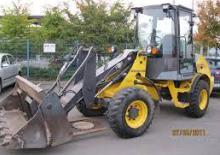 Gumikerekes homlokrakodók New Holland W50 TC