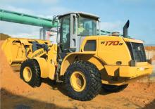 Gumikerekes homlokrakodók New Holland W170B TC