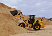 Gumikerekes homlokrakodók New Holland W170C LR