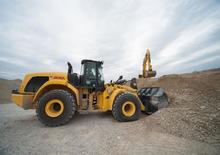 Gumikerekes homlokrakodók New Holland W300C LR