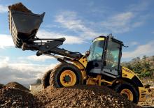 Gumikerekes homlokrakodók New Holland W60B TC
