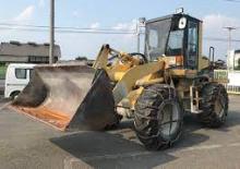 Gumikerekes homlokrakodók Komatsu WA 100-1