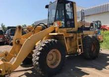 Gumikerekes homlokrakodók Komatsu WA 300-1