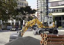 Gumikerekes kotrók Liebherr A 309 Litronic
