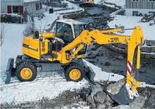 Gumikerekes kotrók Liebherr A 310 B
