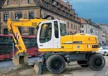 Gumikerekes kotrók Liebherr A 312 Litronic