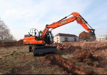 Gumikerekes kotrók Doosan DX140W-5