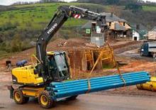 Gumikerekes kotrók Volvo EW140C
