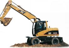 Gumikerekes kotrók Caterpillar M 313 C VAH