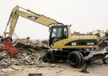 Gumikerekes kotrók Caterpillar M 318 Mono