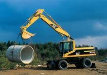 Gumikerekes kotrók Caterpillar M 320 VAH