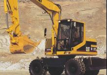 Gumikerekes kotrók Caterpillar M312