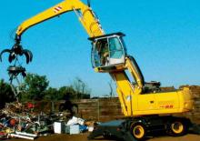 Gumikerekes kotrók New Holland MH 8.6