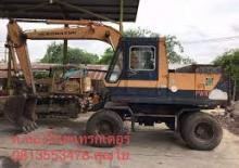 Gumikerekes kotrók Komatsu PW100-1