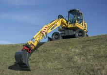 Gumikerekes kotrók Komatsu PW148-10