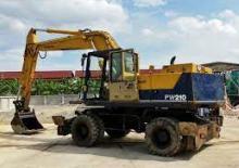 Gumikerekes kotrók Komatsu PW210-1