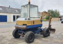Gumikerekes kotrók Komatsu PW30-1