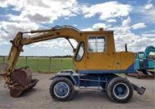Gumikerekes kotrók Komatsu PW60-1