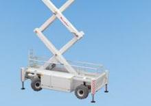 Gumikerekes ollós személyemelők Holland-Lift T 210 DL 25 4WD P/N