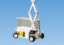Gumikerekes ollós személyemelők Holland-Lift Y 83 DL 16 4WD N