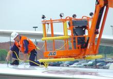 Gumikerekes töretőgémes munkaállványok JLG 740 AJ