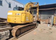 Lánctalpas kotrók John Deere Construction 135C