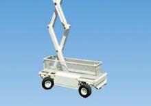 Lánctalpas ollós személyemelők Holland-Lift Q-135 DL 24 TR