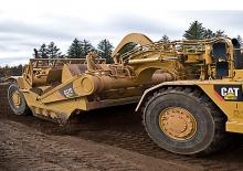 Szkréperek Caterpillar 637G Auger