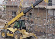 Teleszkópos rakodók Caterpillar TH 63