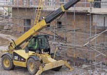 Teleszkópos rakodók Caterpillar TH 83